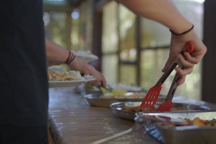 Food table with different choices in Amazon lodge