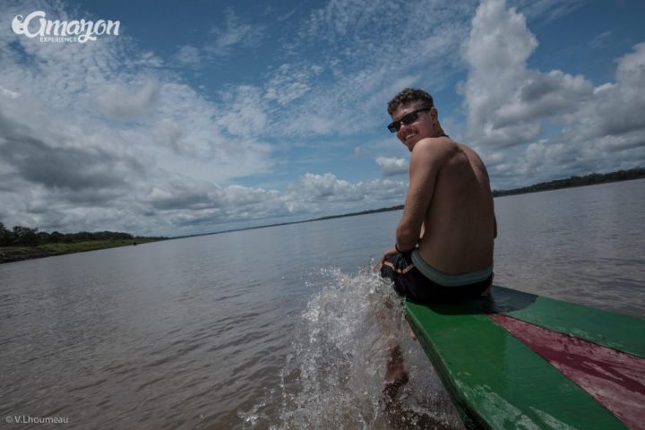 Amazon jungle tours. Our friend enjoying the view in the Amazon river.