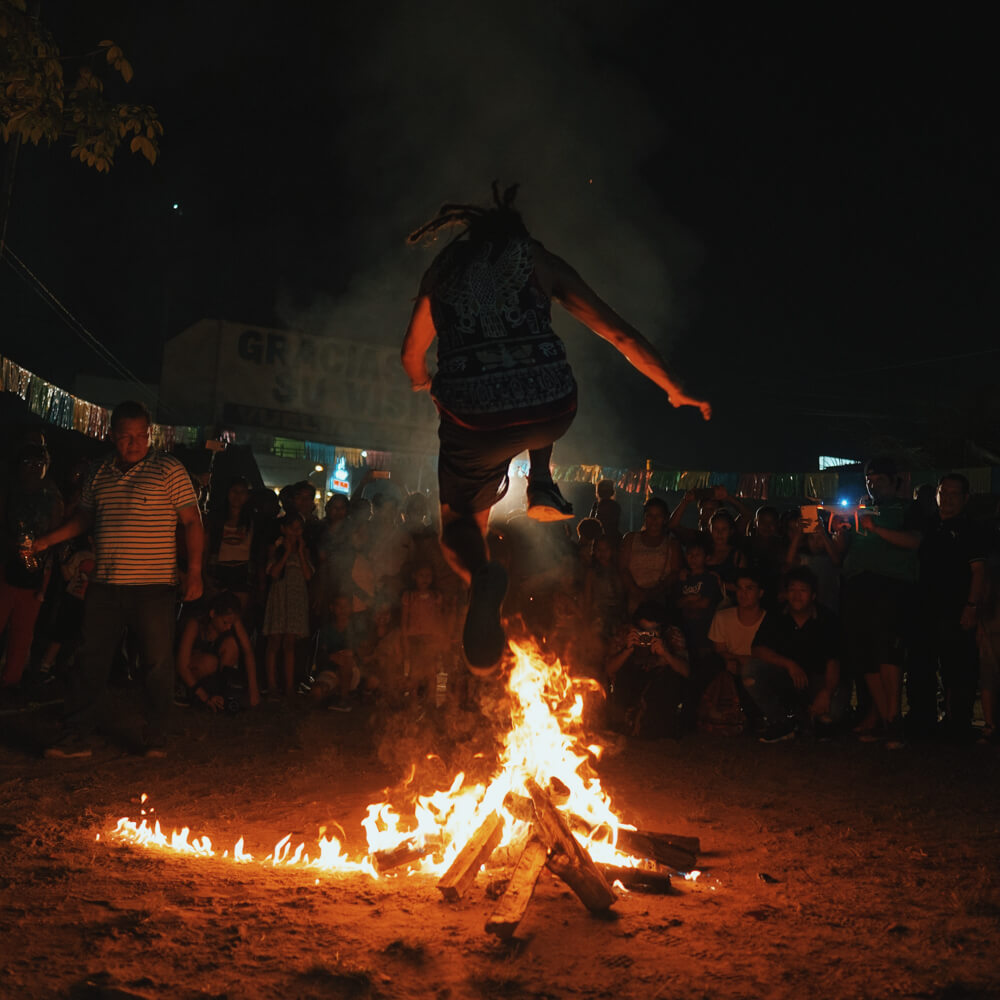 Jumping fire in Saint John festival. Iquitos, Peru